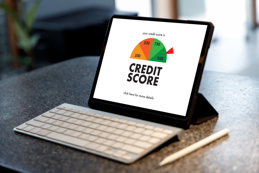 laptop screen displaying credit score